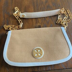 Tory Burch woven white leather clutch.